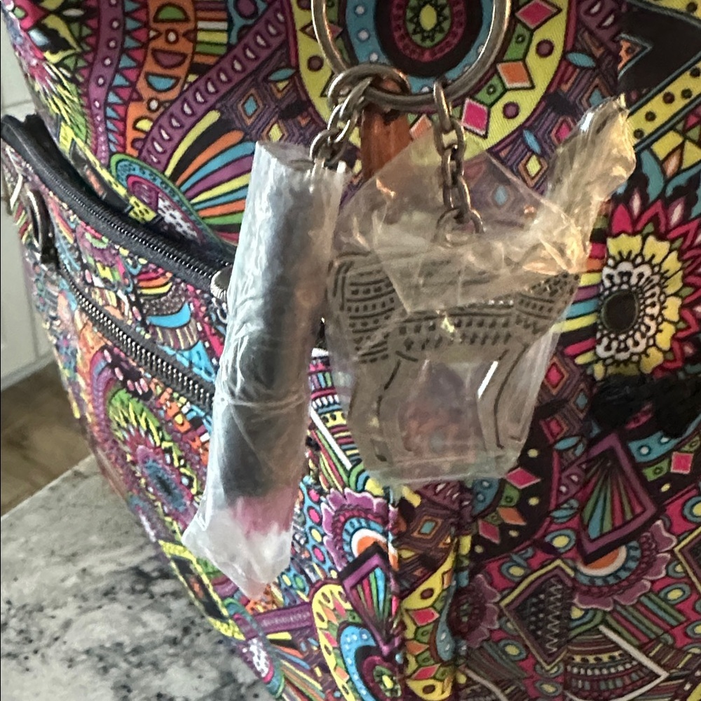 Sakroots Red and Pink Bohemian Backpack with Artistic Flair - Picture 9 of 9
